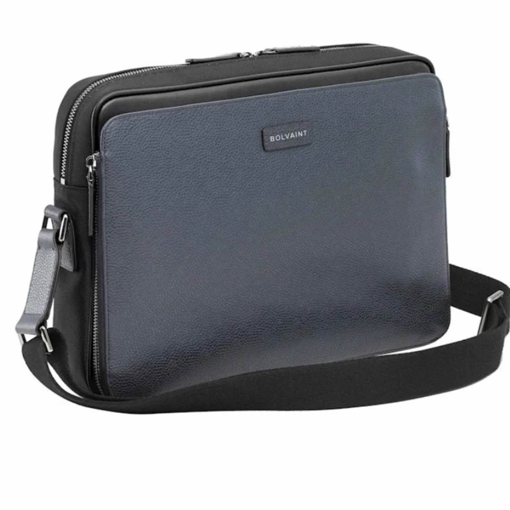 Graphite Blue/Black Trim Laptop Bag with Adjustable Strap and Textured Fabric.